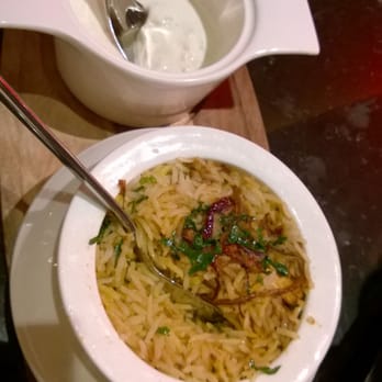 Madhu's Heathrow - Chicken biryani and raita side - Indian Near Me - Gt Lon, XGL Madhu's Heathrow - Chicken biryani and raita side - Indian Near Me - Gt Lon, XGL