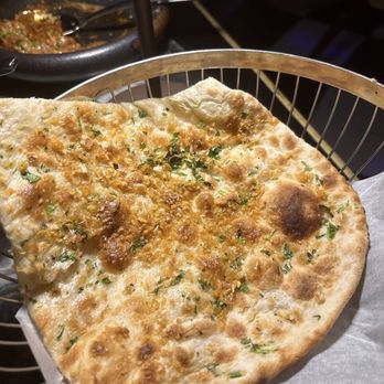 Musaafer - Garlic Naan - Indian Near Me - Houston, Texas Musaafer - Garlic Naan - Indian Near Me - Houston, Texas