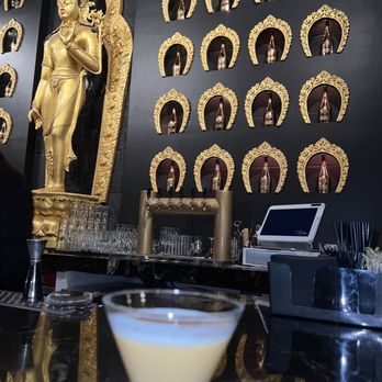 Taipo - a cocktail in a glass on a bar - Asian Fusion Near Me - Arlington, Texas Taipo - a cocktail in a glass on a bar - Asian Fusion Near Me - Arlington, Texas