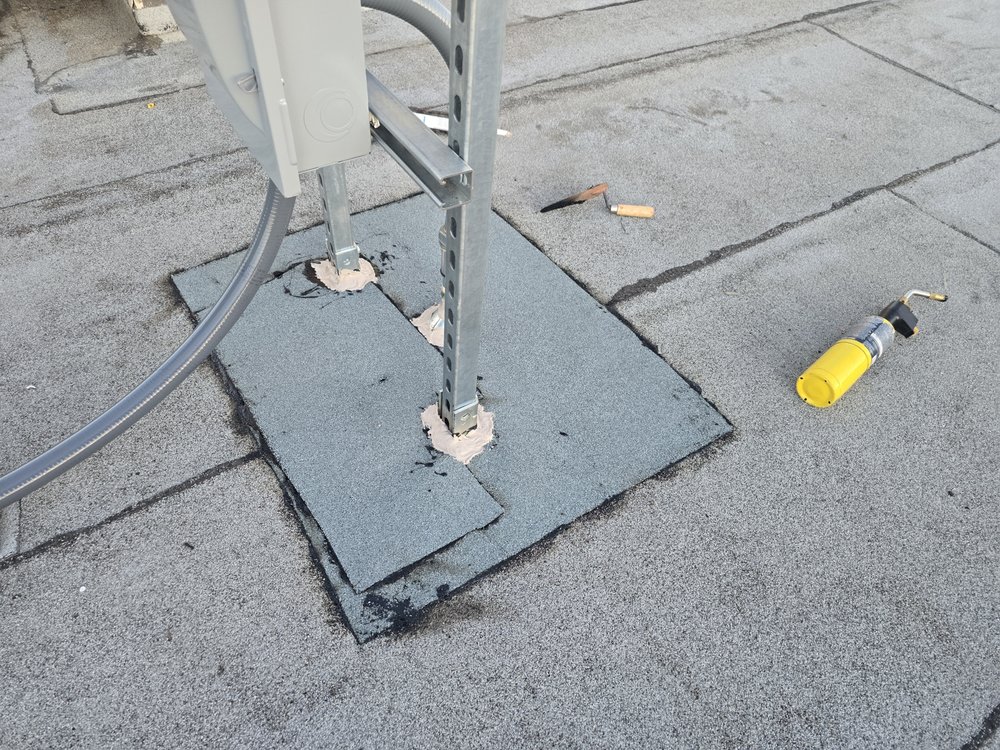 Slide of Tonty Roofer