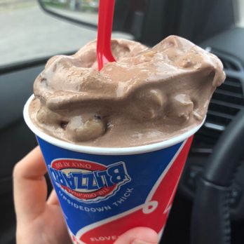 Dairy Queen Store - a hand holding a cup of chocolate ice cream - Ice Cream & Frozen Yogurt Near Me - Ann Arbor, Michigan
