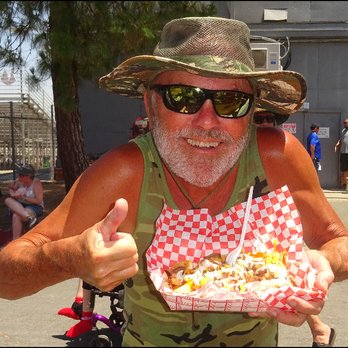 Mr Pork - I'm a happy guy, as I'm getting ready to enjoy an amazing lunch of sausage and fries, thanks to the friendly staff at Mr. Pork Grill. - Caterers Near Me