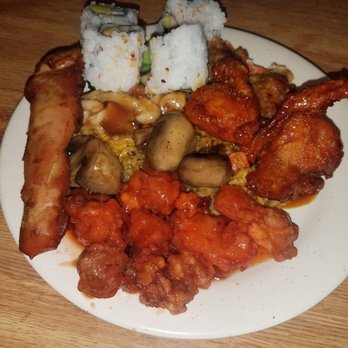 China Buffet - a plate of food on a wooden table - Cantonese Near Me - Mauston, Wisconsin