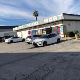 cars parked in front of the store cars parked in front of the store