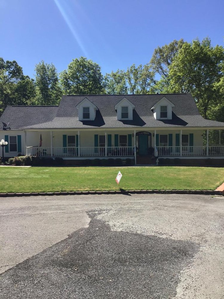 Slide of Tycon Roofing