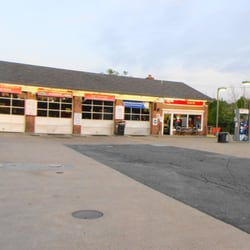 Virginia Official Auto Safety & Emission Testing Station - view of the service bays and store from pump area