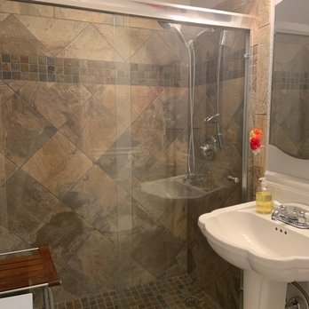 Ryan Mcclain Construction - Accessible Shower with porcelain tiles. - General Contractors Near Me Ryan Mcclain Construction - Accessible Shower with porcelain tiles. - General Contractors Near Me