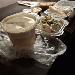 Saigon Roll - Thai coconut noodle soup with soup separate from chicken and noodle on takeout order