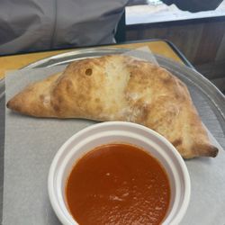 Sal's Italian Restaurant & Pizzeria - Pepperoni and sausage calzone ( cold inside )