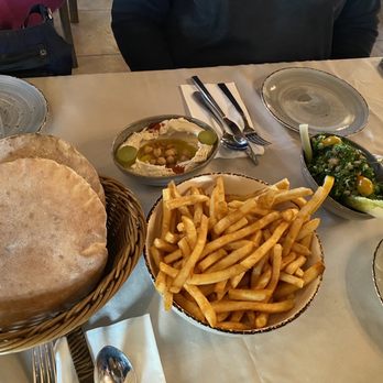 The Castle Mediterranean Grill - Fries, hummus, tabouli, bread - Hookah Bars Near Me - Anaheim, California