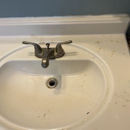 Filthy sink in the men's room
