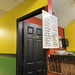 a menu hanging from the ceiling