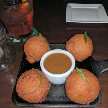 Bosscat Kitchen & Libations - Pork hush puppies! - New American Near Me - Houston, Texas Bosscat Kitchen & Libations - Pork hush puppies! - New American Near Me - Houston, Texas