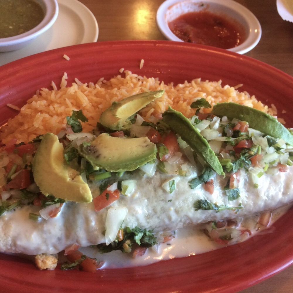 Burrito Vaquero with Chorizo, Steak, and Chicken. Burrito Vaquero with Chorizo, Steak, and Chicken.