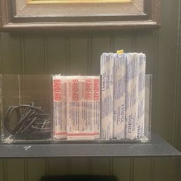 Hair ties, band aids and tampons at your disposal. Thoughtful touches.