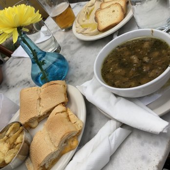 Coffee Bar Blue Door - Melted cheese on toasted ciabatta with chips, soup of the moment ('Italian wedding'), and hummus with Italian melba toast. - Coffee & Tea Near Me - Stuart, Florida