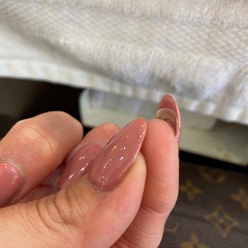 Cinderella Nails - Under nails sticking outside of the acrylic - Nail Salons Near Me - Mountain View, California