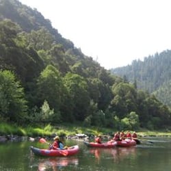 ROW Adventures - "Duckies" in foreground as ROW preps a trip on the Rogue River.