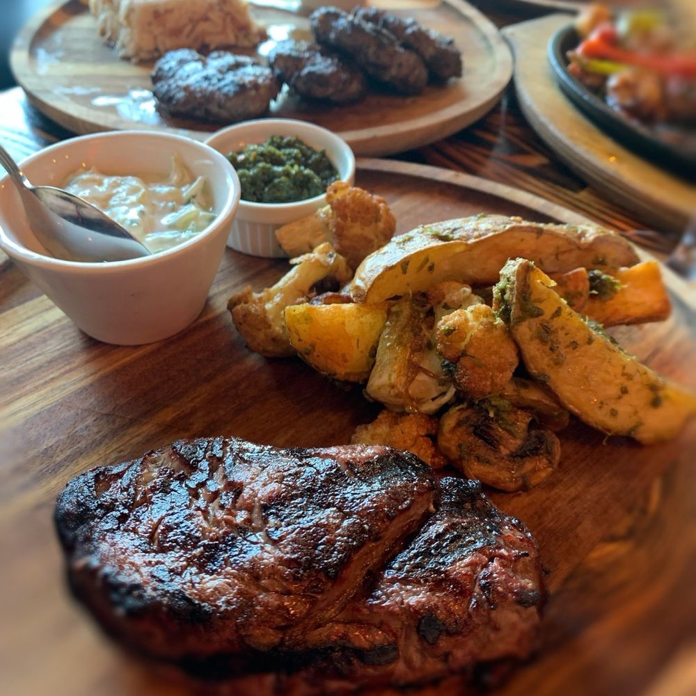 Ludda - Ribeye medium rare with frittes and roasted vegetables - Mediterranean Near Me - Los Angeles, California Ludda - Ribeye medium rare with frittes and roasted vegetables - Mediterranean Near Me - Los Angeles, California