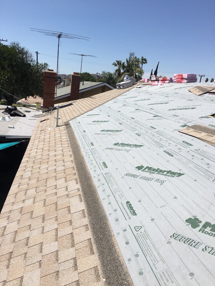 Slide of Thompson Roofing