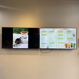 two televisions on the wall