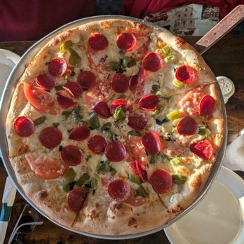 Toni's Pizza - This is the Large White Pizza with Green Peppers and Pepperoni added. Photo taken January 4, 2025. - Pizza Near Me - Virginia Beach, Virginia Toni's Pizza - This is the Large White Pizza with Green Peppers and Pepperoni added. Photo taken January 4, 2025. - Pizza Near Me - Virginia Beach, Virginia