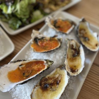 Saltwater Oyster Depot - Katz Butter Broiled Oysters (left), White Wine Butter Broiled Oysters (right) - Seafood Near Me - Inverness, California Saltwater Oyster Depot - Katz Butter Broiled Oysters (left), White Wine Butter Broiled Oysters (right) - Seafood Near Me - Inverness, California