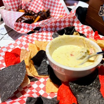Tailgaters - Chips and Queso Mango Habanero Chicken Wings - Pizza Near Me - Surprise, Arizona Tailgaters - Chips and Queso Mango Habanero Chicken Wings - Pizza Near Me - Surprise, Arizona