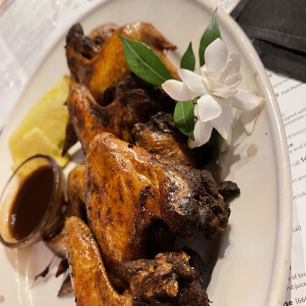 Bahama Breeze - Jamaican Jerk chicken Wings I added the gardenia to it found outside ( smelled so good) - Caribbean Near Me - Duluth, Georgia