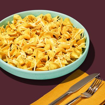 Noodles and Company - a bowl of noodles and a fork - Noodles Near Me - West Bend, Wisconsin Noodles and Company - a bowl of noodles and a fork - Noodles Near Me - West Bend, Wisconsin