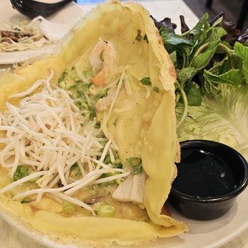 Yummy Yummy - Inside the crepe with meats, shrimps and bean sprouts. It could use a little bit more seasoning - Vietnamese Near Me - San Francisco, California Yummy Yummy - Inside the crepe with meats, shrimps and bean sprouts. It could use a little bit more seasoning - Vietnamese Near Me - San Francisco, California