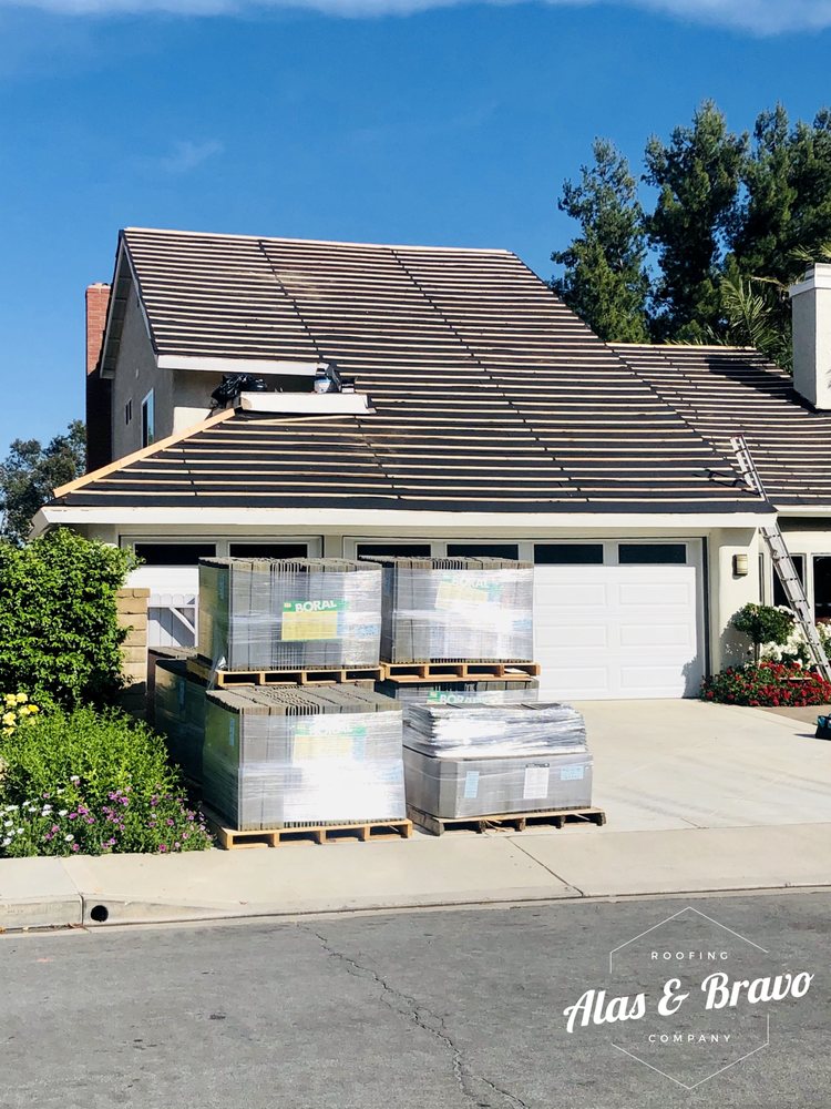 Slide of Alas & Bravo Roofing Company