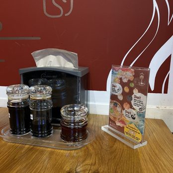 Dumpling District - Soy sauce, vinegar, chili oil, and soup dumpling consumption instructions - Dim Sum Near Me - Ellicott City, Maryland