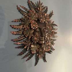 Facials By carrie Morrone - Beautiful sculpture on the wall!