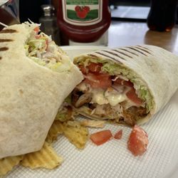 Pauli's Deli & Bagels - Chicken cutlet wrap with LTM onions & American cheese.. delicious !