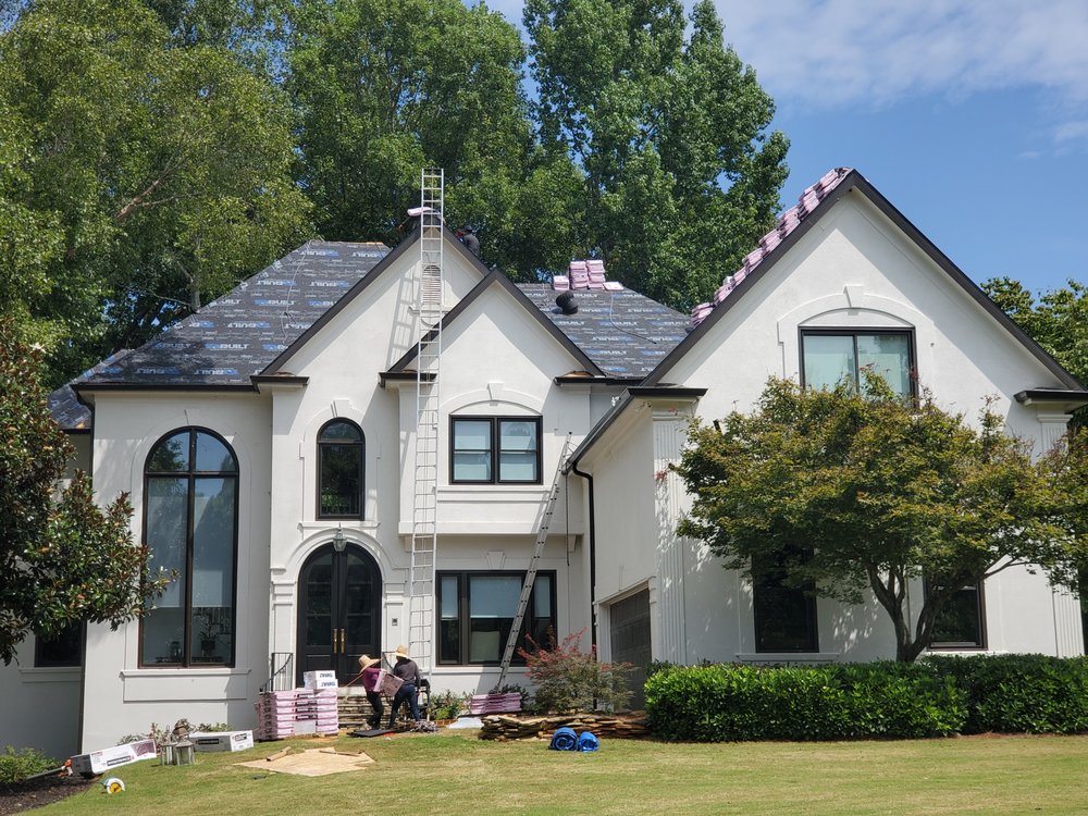 Slide of The Roofing Specialists