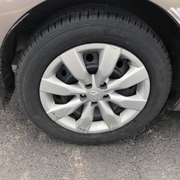 The new Cooper tire with the hubcap reattached. Thanks Reid's!!!