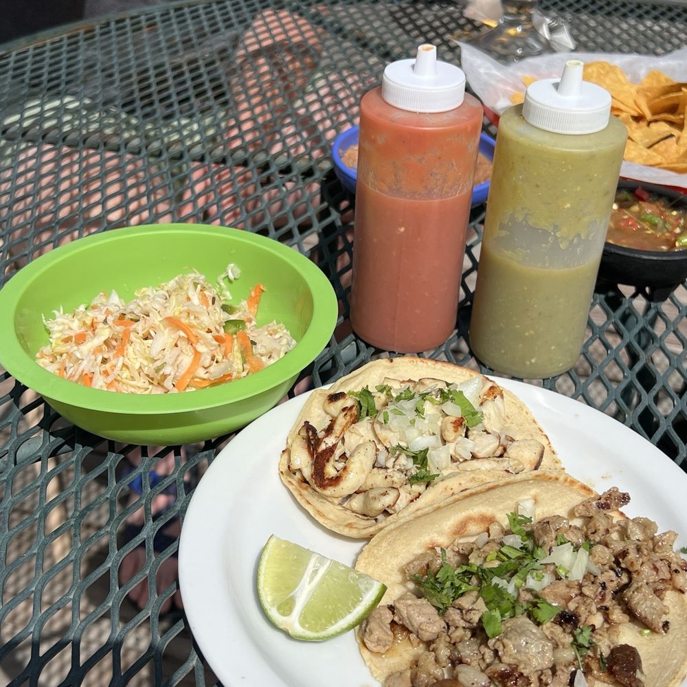 Chicken and beef tacos with homemade tortillas and delicious salsas!