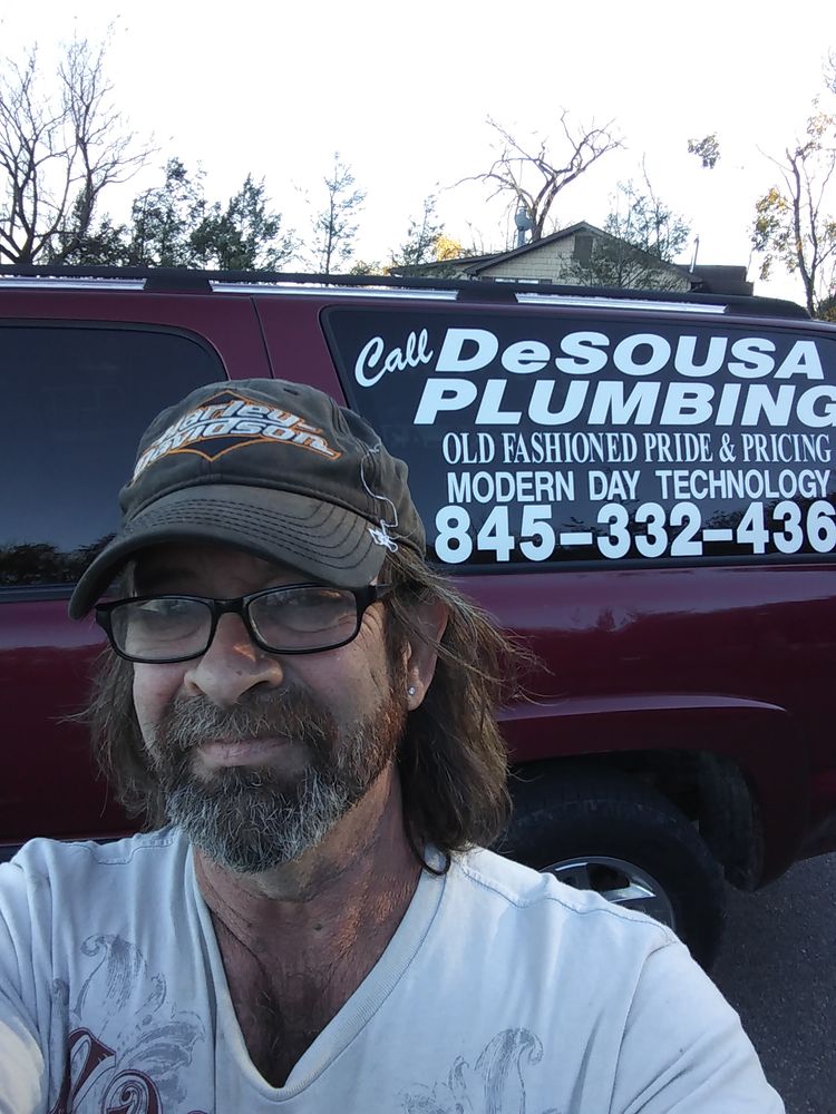 Slide of Desousa Plumbing