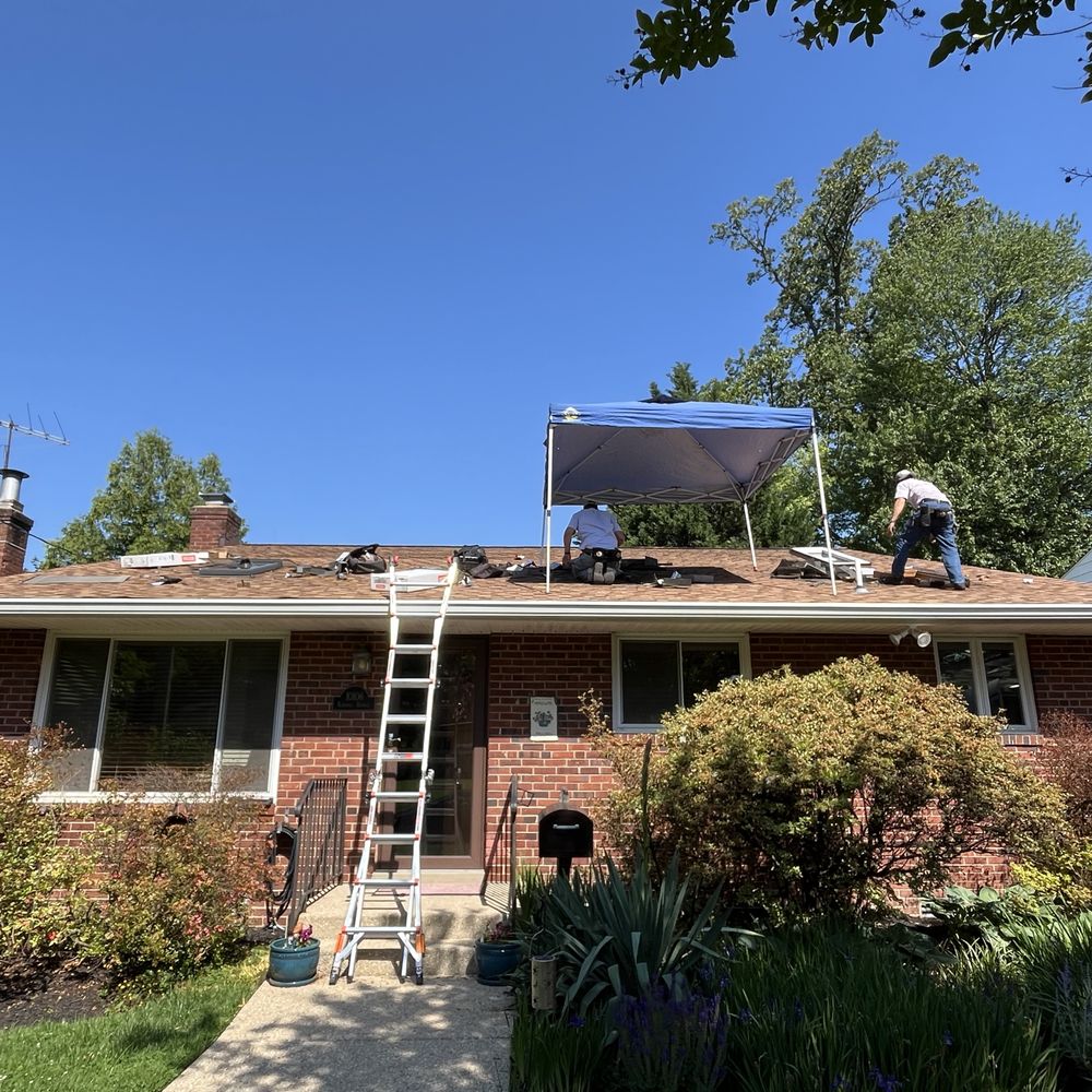 SkyWright - During installation on a very hot day.   Used a tent to shield from heat and sun - Windows Installation Near Me - Bethesda, Maryland