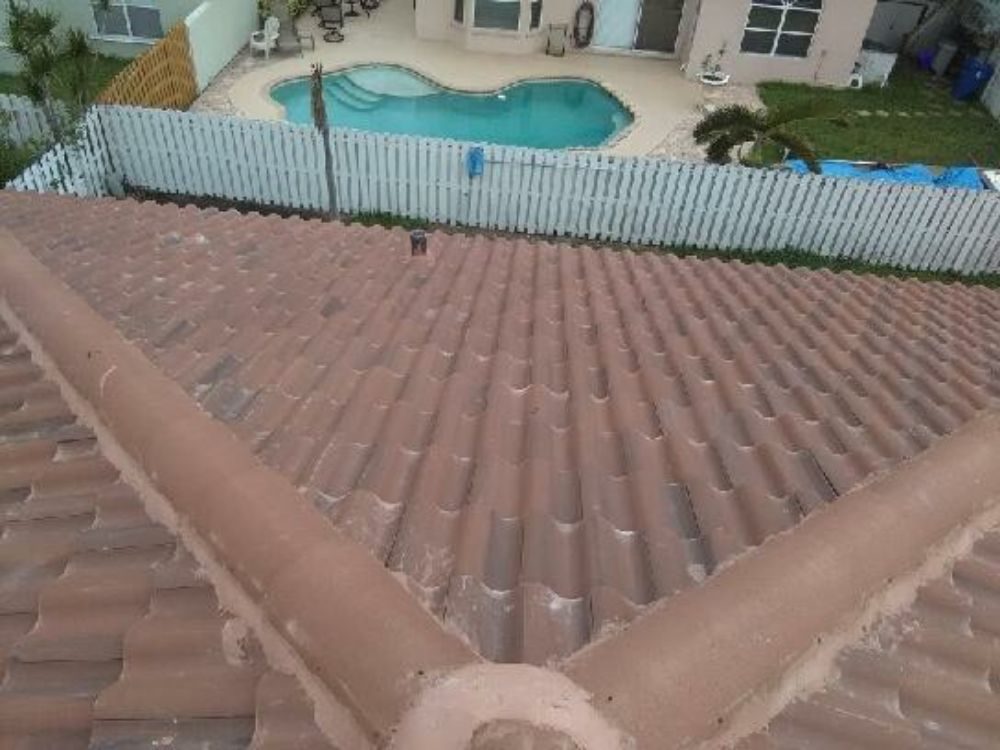 Slide of Rick's Roofing and Repairs