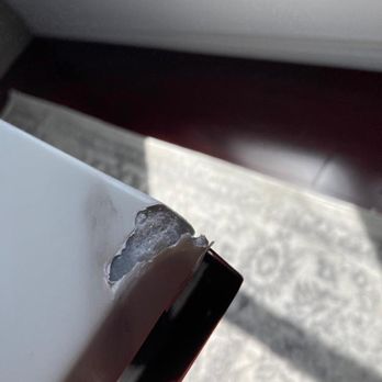 Modani Furniture Dallas - Chip/damage, showing the cheap coating. - Furniture Stores Near Me - Dallas, Texas