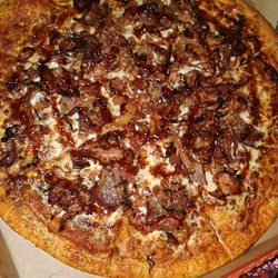 Little Caesar's Pizza - Gourmet Little Caesar's? The Smokehouse pizza. Beef brisket, pulled pork, applewood smoked bacon, & BBQ sauce. Best pizza I've ever had!