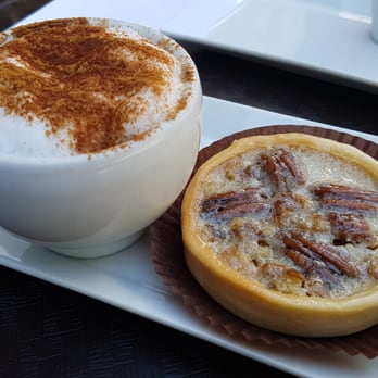 Brioche Dorée - a cup of coffee and a pastry - Bakeries Near Me - Westmount, Quebec