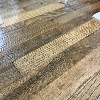 DaBella - Scratched wood floor. I had these refinished less than a year ago over $1k! - Roofing Near Me - Denver, Colorado DaBella - Scratched wood floor. I had these refinished less than a year ago over $1k! - Roofing Near Me - Denver, Colorado