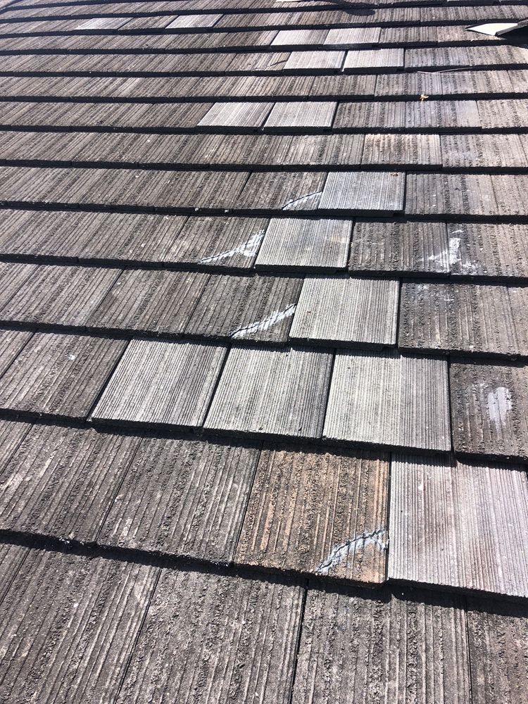 Slide of New Era Roofing