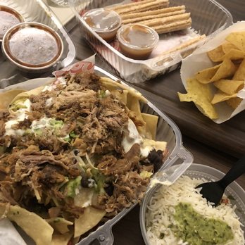 Joyride Taco House - Carnitas nachos and Classic Churros- get the Carmel dipping sauce - Tacos Near Me - Phoenix, Arizona Joyride Taco House - Carnitas nachos and Classic Churros- get the Carmel dipping sauce - Tacos Near Me - Phoenix, Arizona