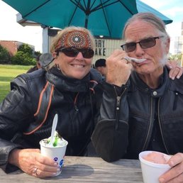 a man and a woman eating ice cream a man and a woman eating ice cream