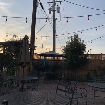 Caffe Tazza - a patio with tables and chairs - Wine Bars Near Me - Dansville, New York Caffe Tazza - a patio with tables and chairs - Wine Bars Near Me - Dansville, New York