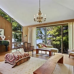 Keefe Vacation Rentals - Built in the 1960's the Tamarack House  features striking exterior lines and inner tranquility - providing guests with views ...